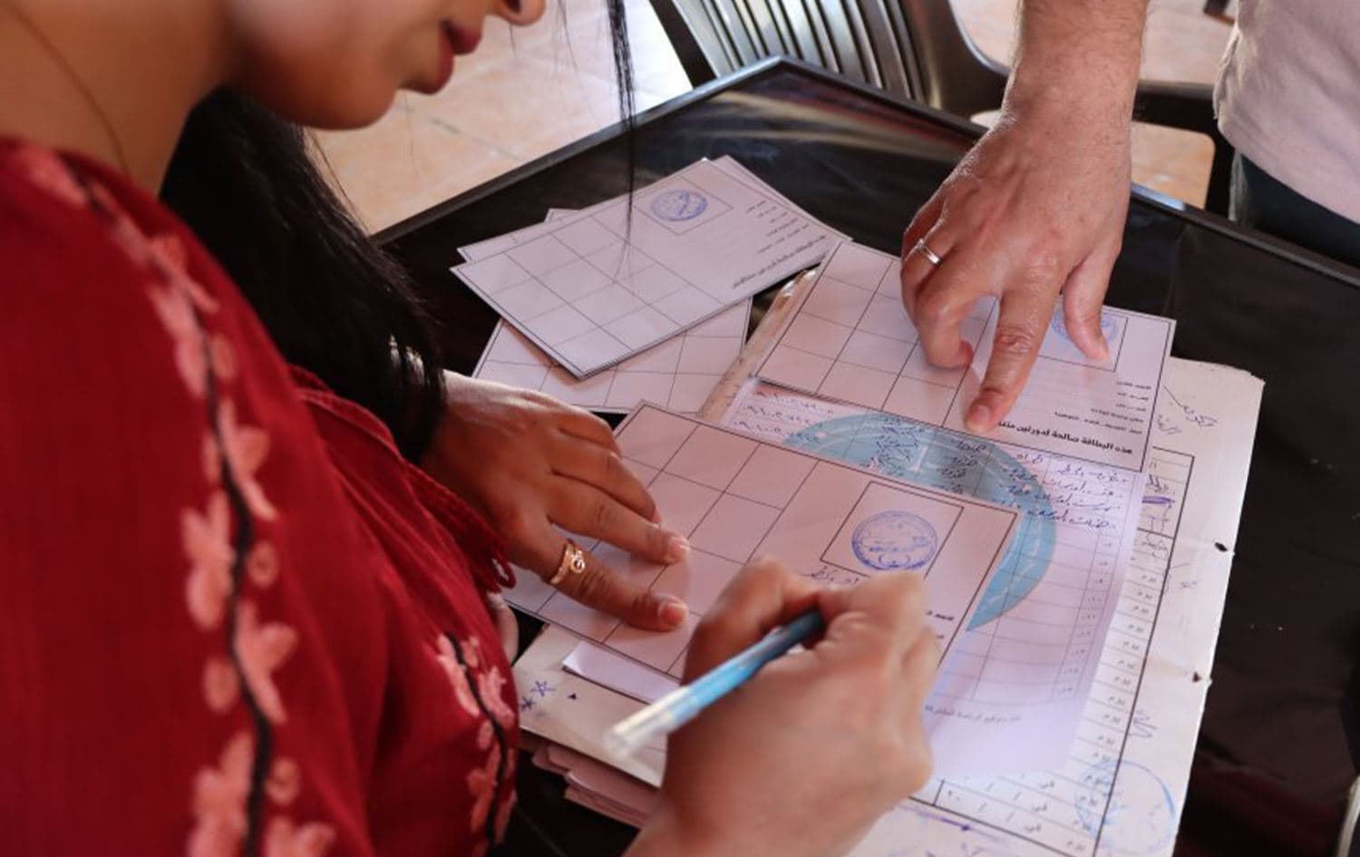 Rojava electoral authorities issue voting cards. Photo: ANHA/file 