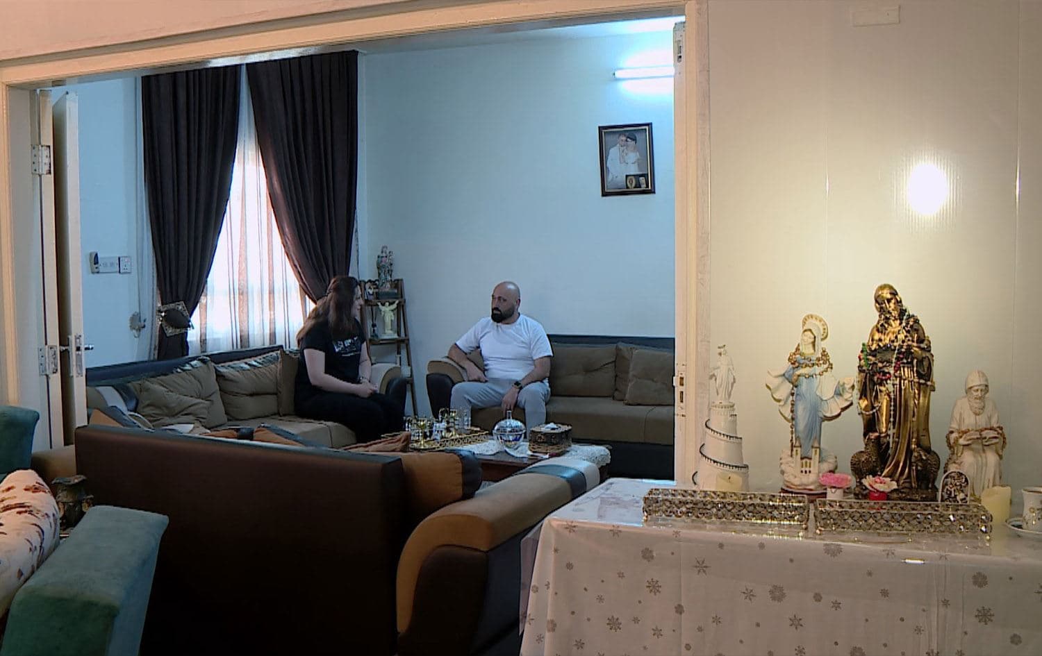 Evlin Joseph (left) and her husband Sami Patros (right) in their Duhok home on May 28, 2024. Photo: Rudaw