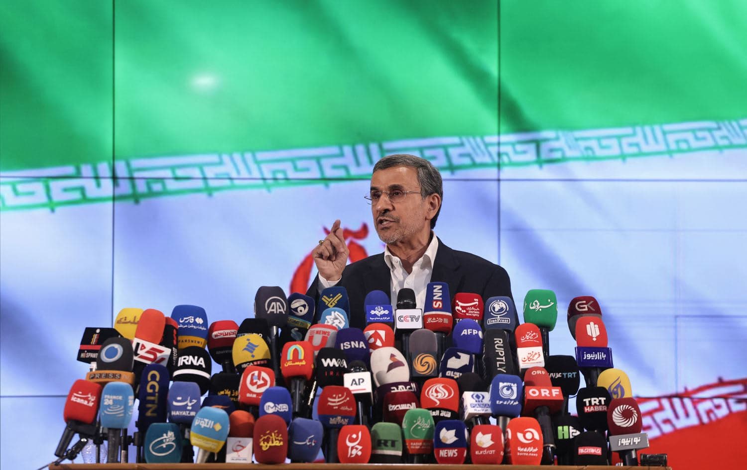 Former Iranian president Mahmoud Ahmadinejad addresses the media after registering his candidacy for Iran's upcoming presidential election in Tehran on June 2, 2024. Photo: ATTA KENARE / AFP