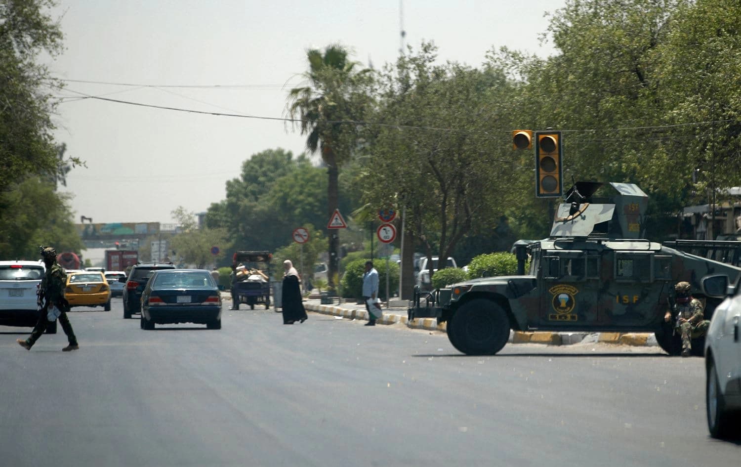 Iraqi security forces secure Palestine Street the day after some 30 people attacked two restaurants, including the American KFC, in Baghdad on June 4, 2024. Photo: Ahmad al-Rubaye/AFP