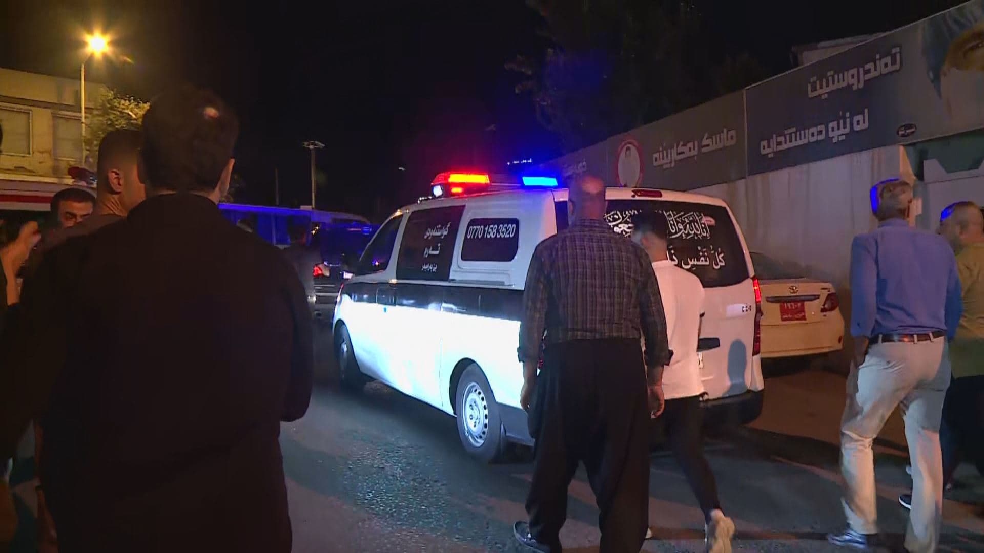 A vehicle carrying the body of a 27-year-old tea-seller, who was shot dead in Sulaimani's Raparin, makes its way from a forensics lab to a graveyard for burial processions on July 27, 2024. Photo: Rudaw/screengrab