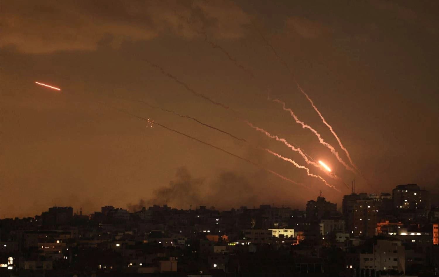 A salvo of rockets is fired by Palestinian militants from Gaza towards Israel on October 10, 2023. Photo: Mahmud Hams/AFP