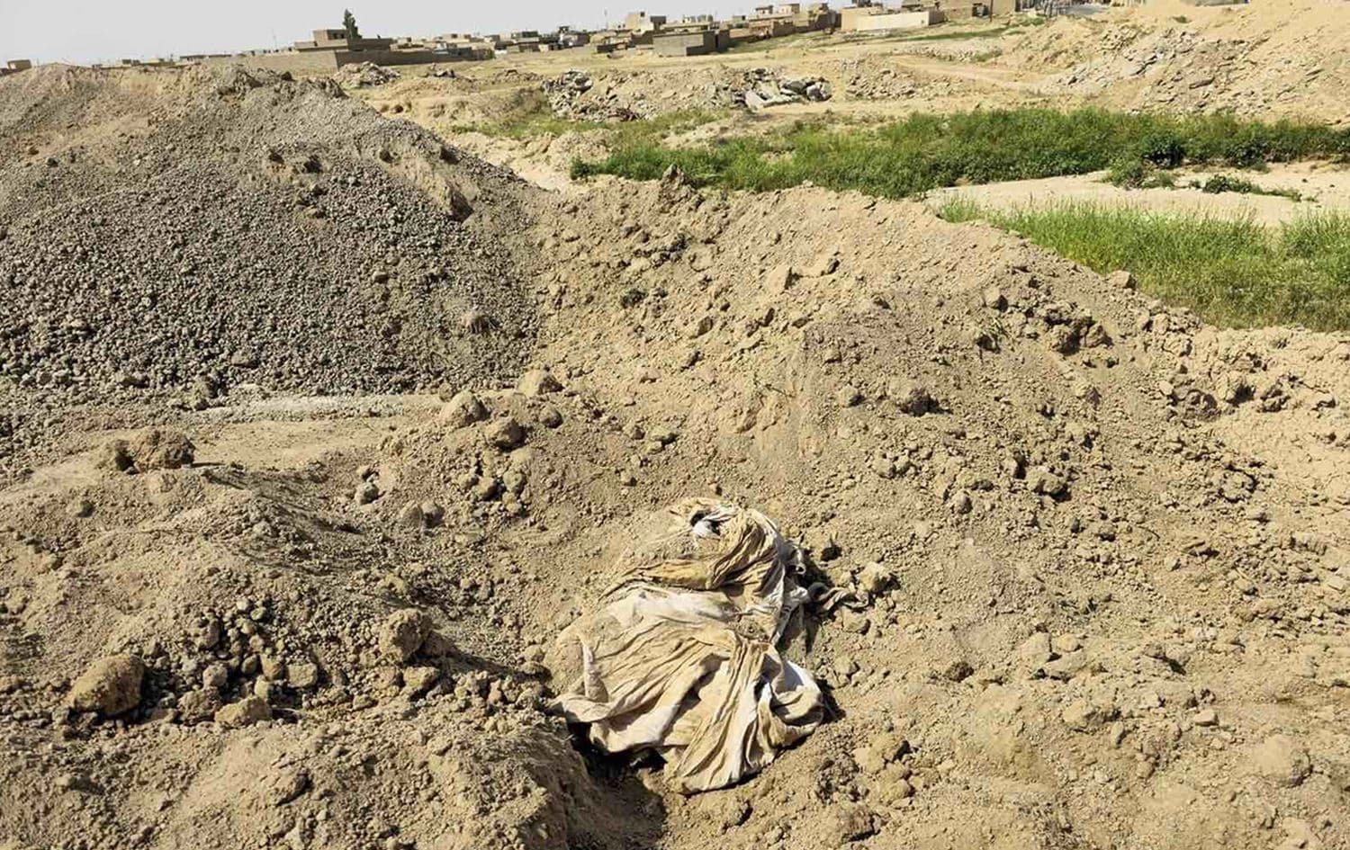 شوێنی گۆڕێکی بەکۆمەڵ لە شنگال. وێنە: ئەرشیڤ