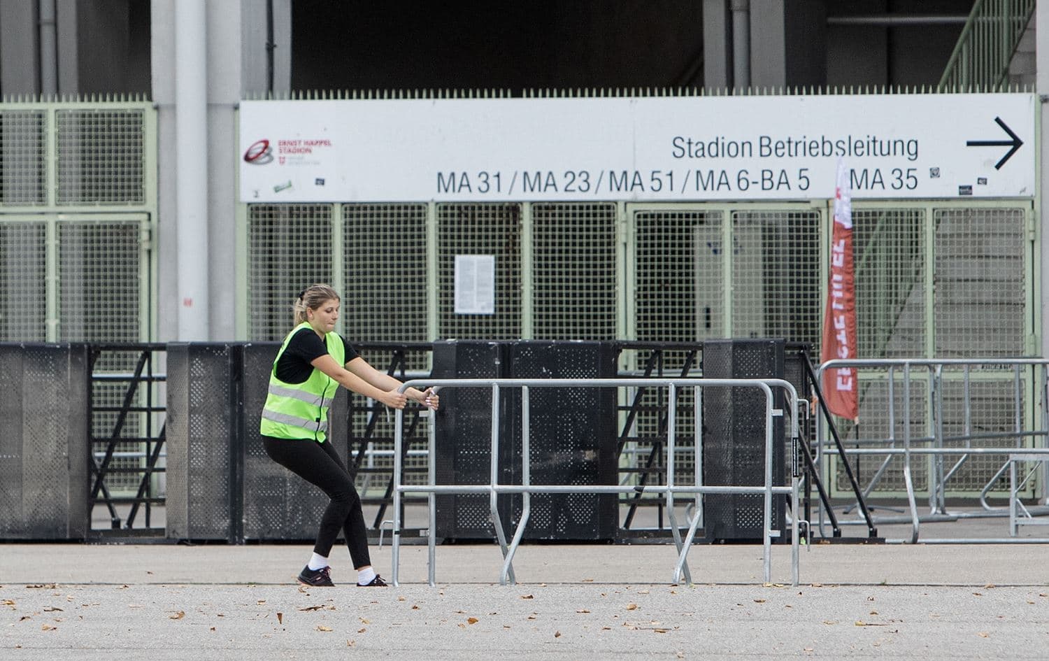 Security guards remove barriers in front of the Ernst Happel Stadium in Vienna, Austria, following the cancellation of a Taylor Swift concert, on August 8, 2024. Photo: Alex Halada/AFP