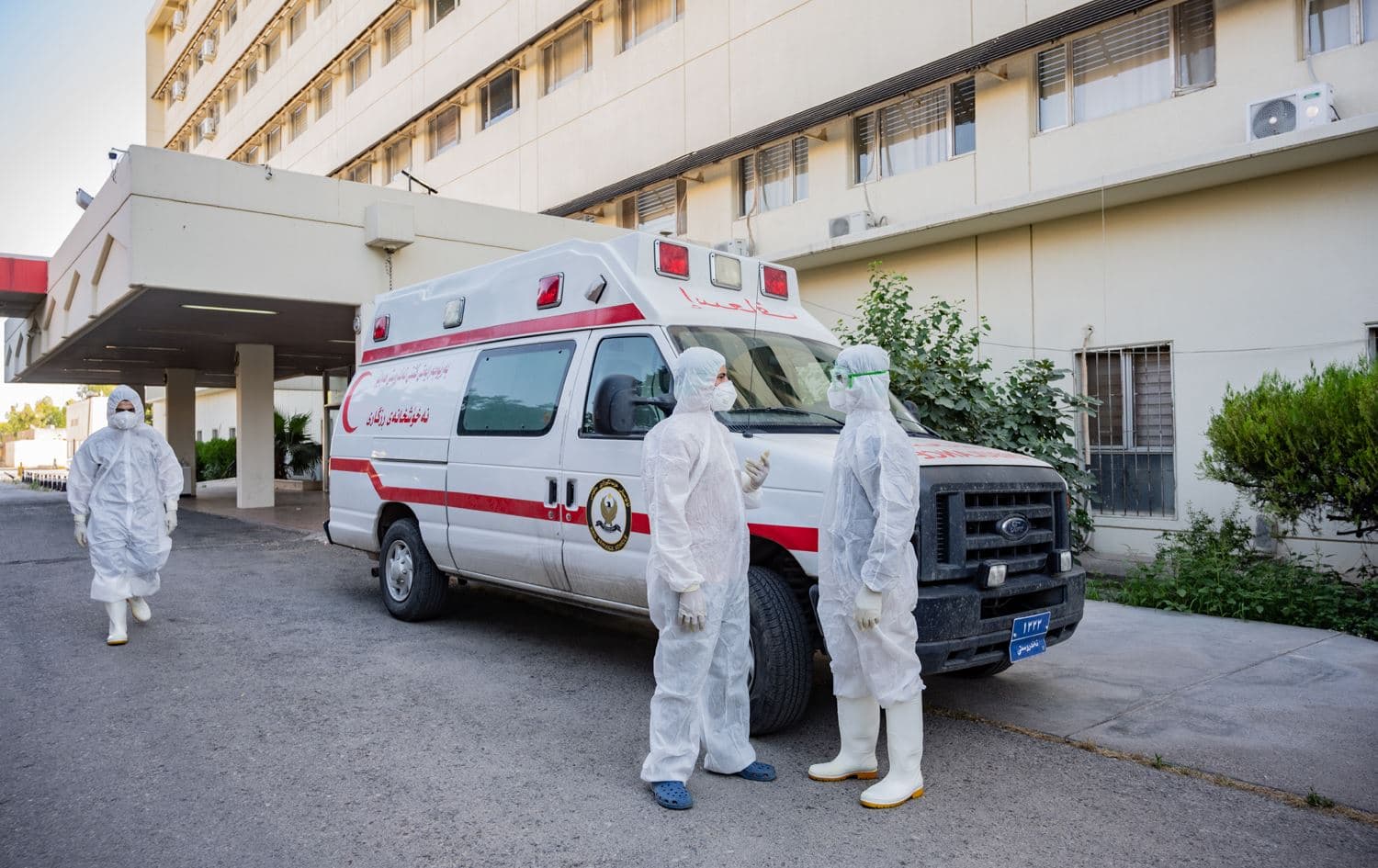 Health workers stand next to an ambulance at Erbil's Rizgari Hospital on June 8, 2020. Photo: Bilind T. Abdullah/Rudaw