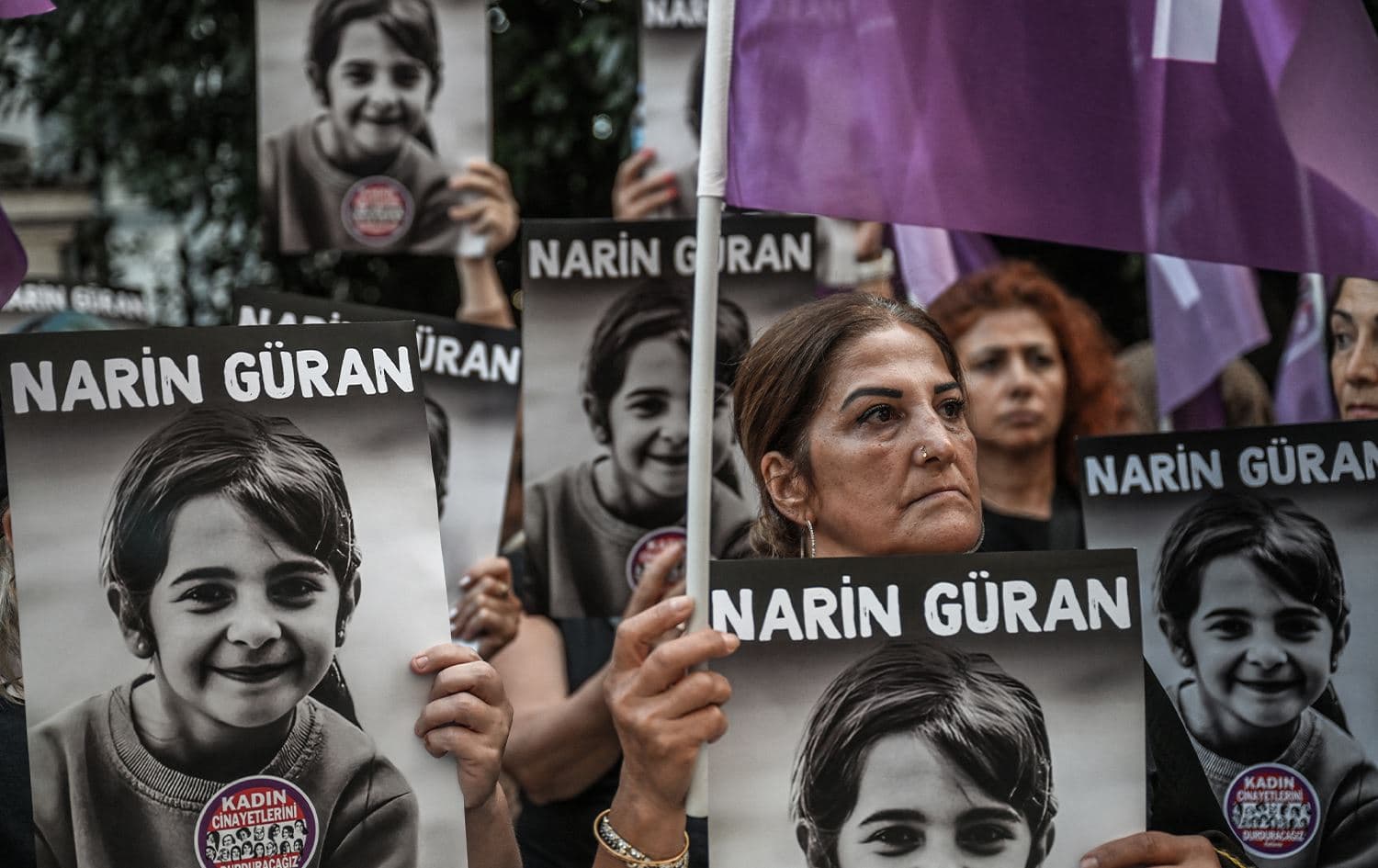 Protesters hold portraits of eight-year-old Narin Guran during a protest at Kadikoy district in Istanbul, on September 8, 2024. Photo: Ozan Kose/AFP