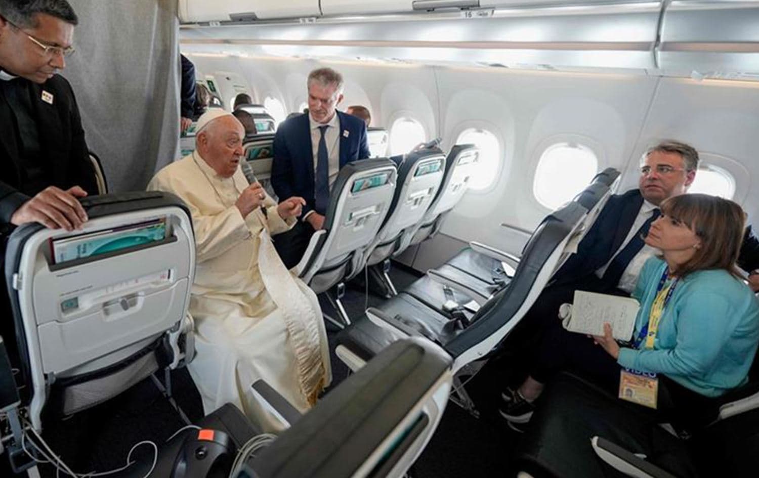 Pope Francis talks to journalists on a flight back to Rome at the end of a four-day visit to Luxembourg and Belgium on September 29, 2024. Photo: AFP