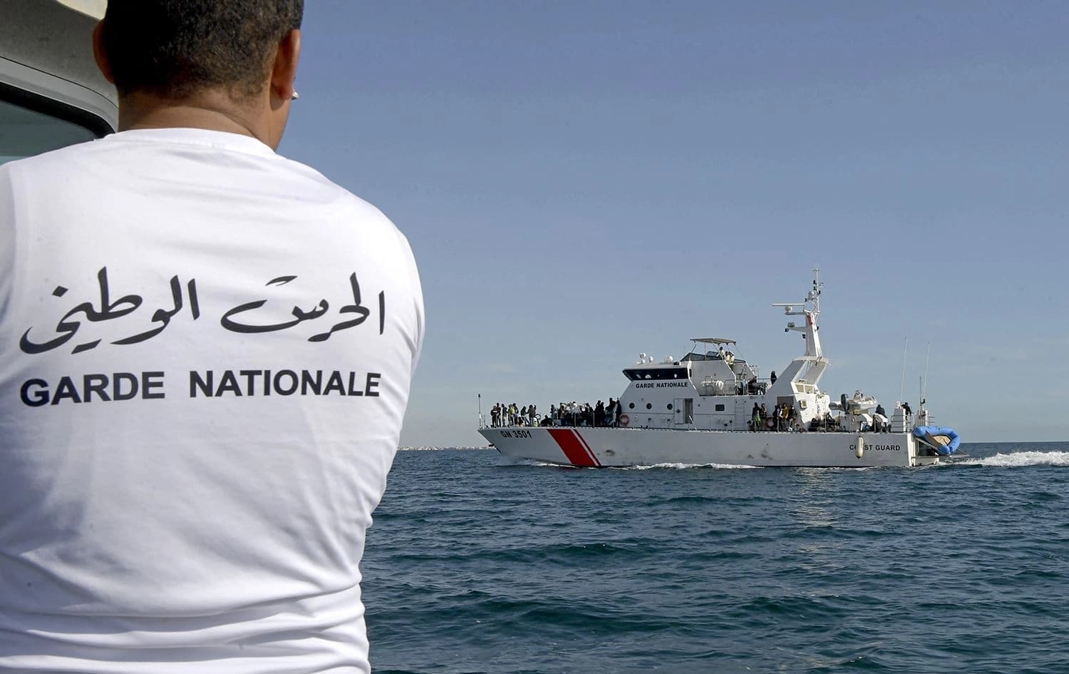 Migrants are rescued by the Tunisian National Guard in the Mediterranean sea off the coast Sfax, Tunisia, October 4, 2022. File photo: Fethi Belaid/AFP