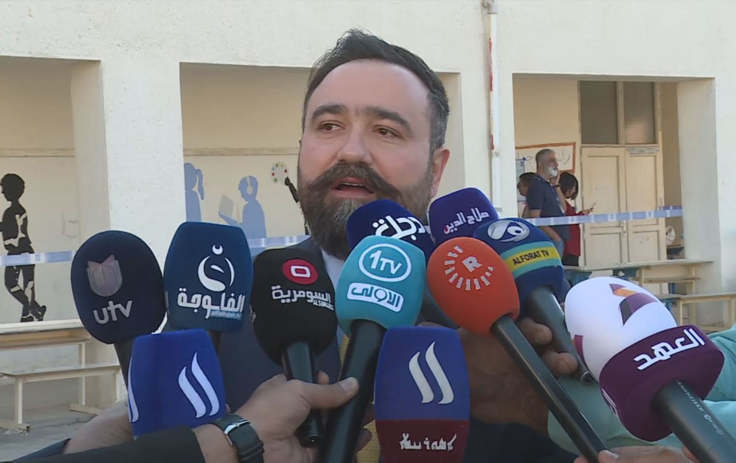 Ano Jawhar Abdoka, KRG minister of transport and communications, speaking to reporters after casting his ballot on October 20, 2024. Photo: Rudaw