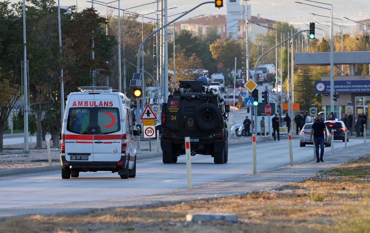  An armored personnel vehicle and an ambulance moved along a road in Kahramankazan, north of Ankara, near the gate of the Turkish Aerospace Industries (TAI) on October 23, 2024. Photo: AFP/Adem Altan
