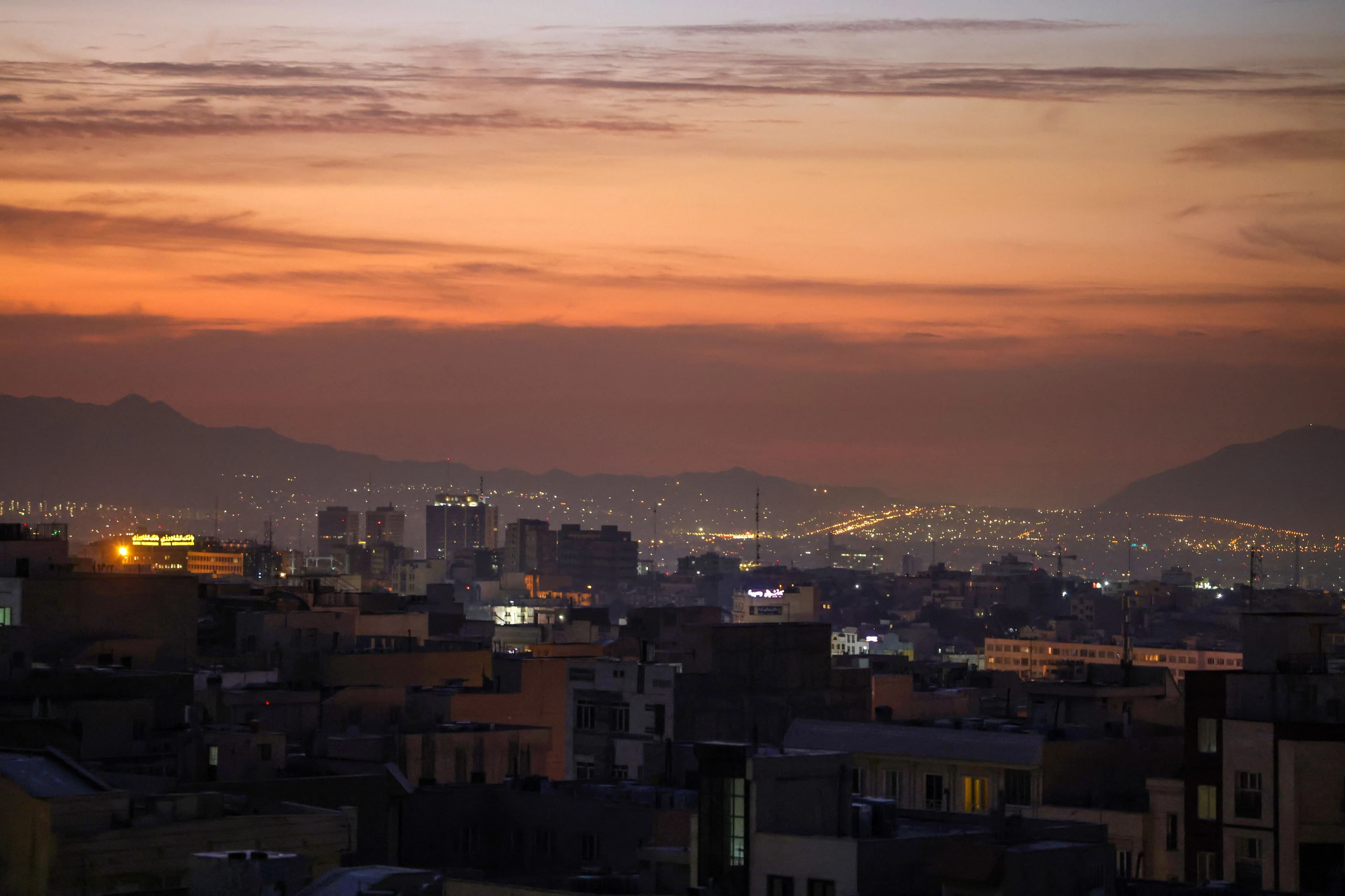 Part of the city skyline is pictured at dawn after several explosions were heard in Tehran on October 26, 2024. Photo: AFP