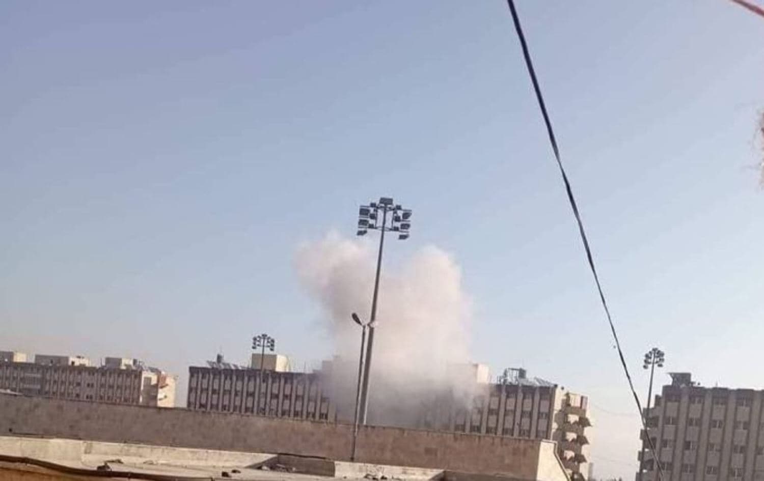 Smoke rises from an attack on a university dormitory in Aleppo, Syria on November 29, 2024. Photo: SOHR