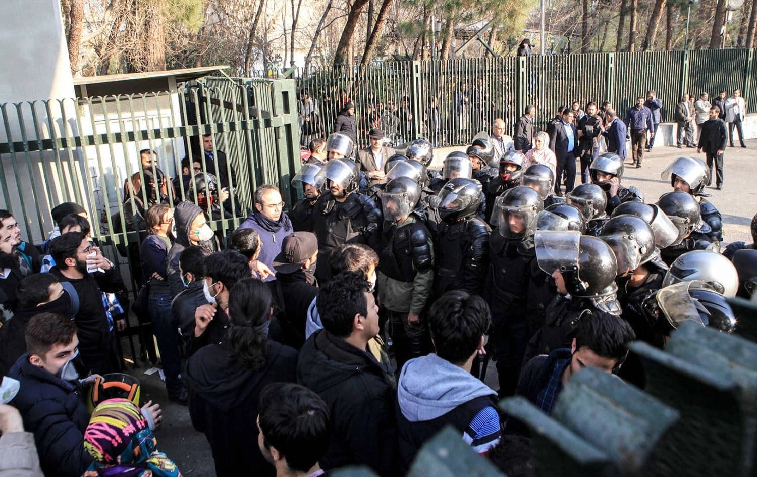 Iranian students scuffle with police at the University of Tehran. File photo: AFP