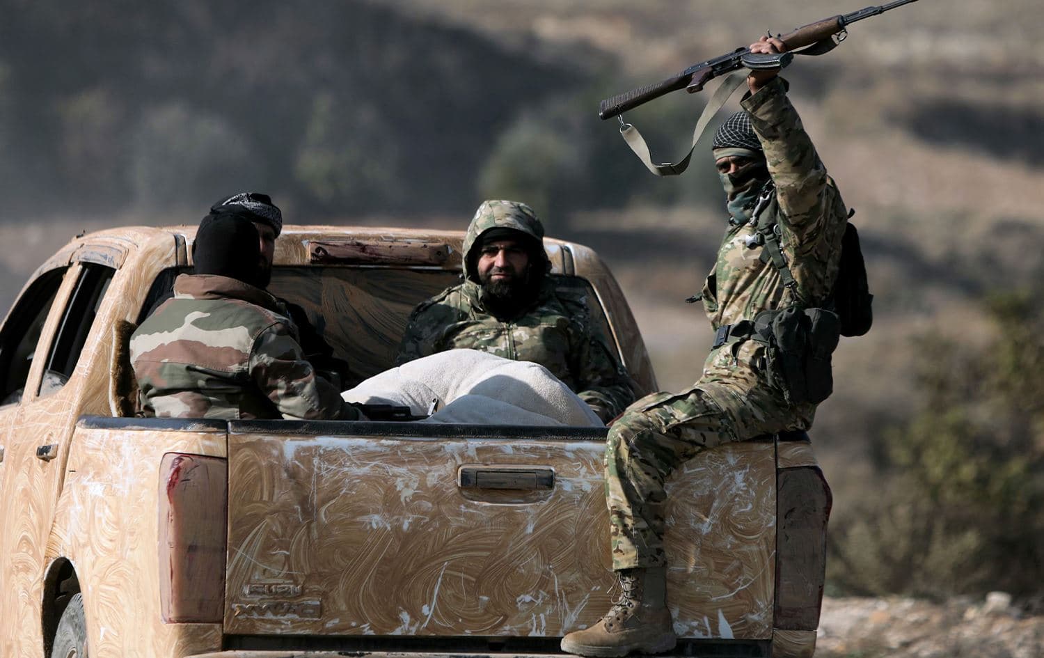 چەند چەکدارێکی دەستەی تەحریر شام. وێنە: AFP