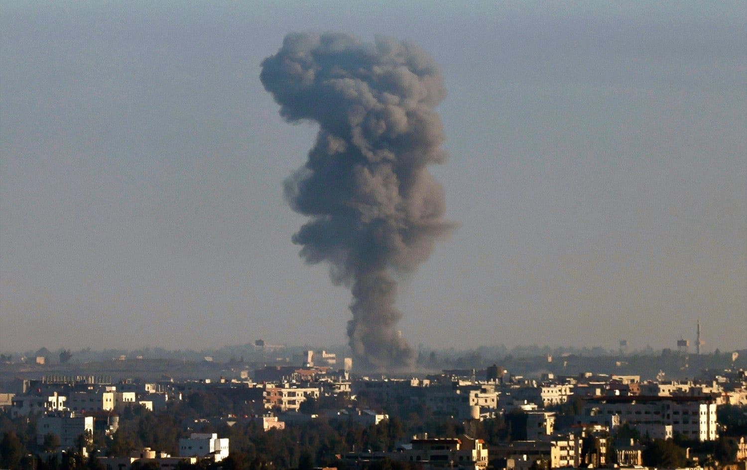 This picture taken from the Israeli-annexed Golan Heights shows smoke billowing above the Syrian Governorate of Quneitra during Israeli bombardment, on December 9, 2024. Photo: Jalaa Marey/AFP
