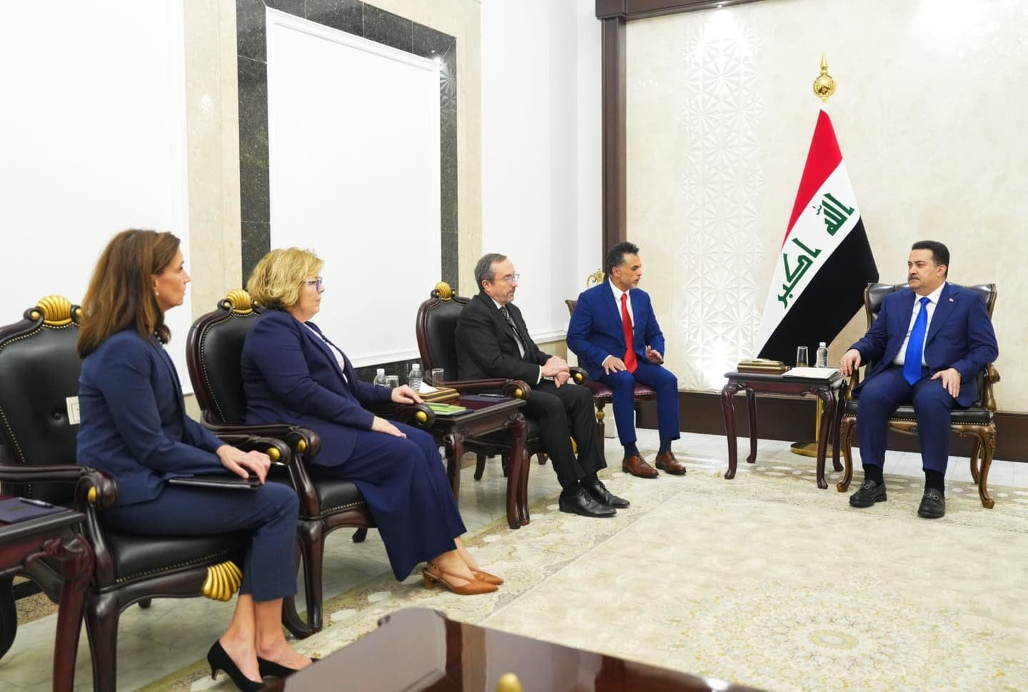 Iraqi PM Mohammed Shia' al-Sudani (right) meeting with a top US delegation in Baghdad on December 11, 2024. Photo: Sudani's office. 