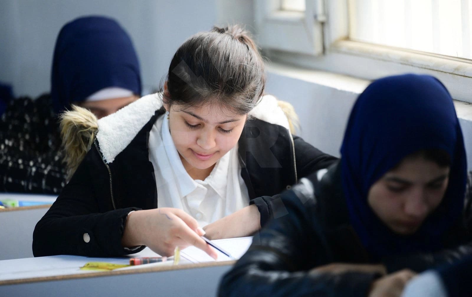 قوتابییەک لە یەکێک لە قوتابخانەکانی هەولێر کە خوێندن تێیاندا رانەوەستاوە. وێنە: بڵند تاهیر - رووداو