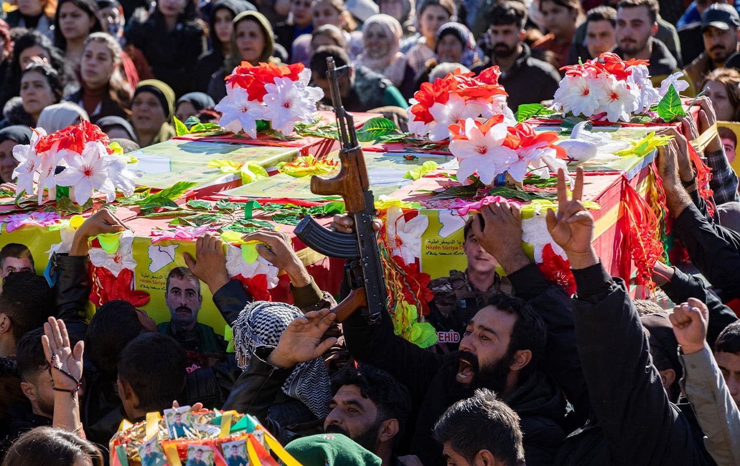 Mourners attend the funeral of five fighters of the Kurdish-led Syrian Democratic Forces (SDF) who were killed in Manbij during clashes with Turkish-backed opposition factions, in Qamishli in northeast Syria (Rojava) on December 14, 2024. Photo: Delil Souleiman/AFP