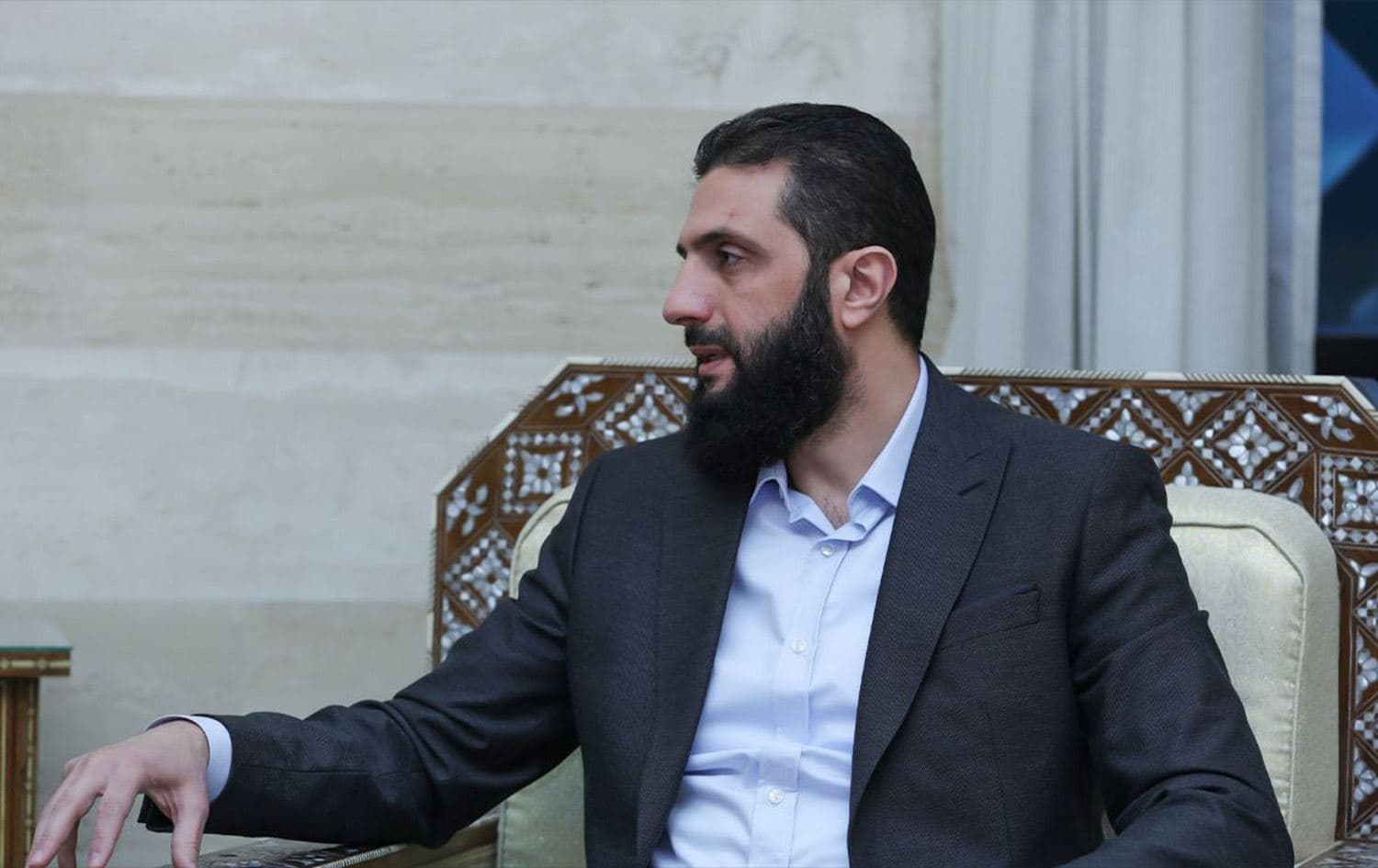 Ahmad al-Sharaa during a meeting with a British delegation in Damascus on December 17. Photo: State media