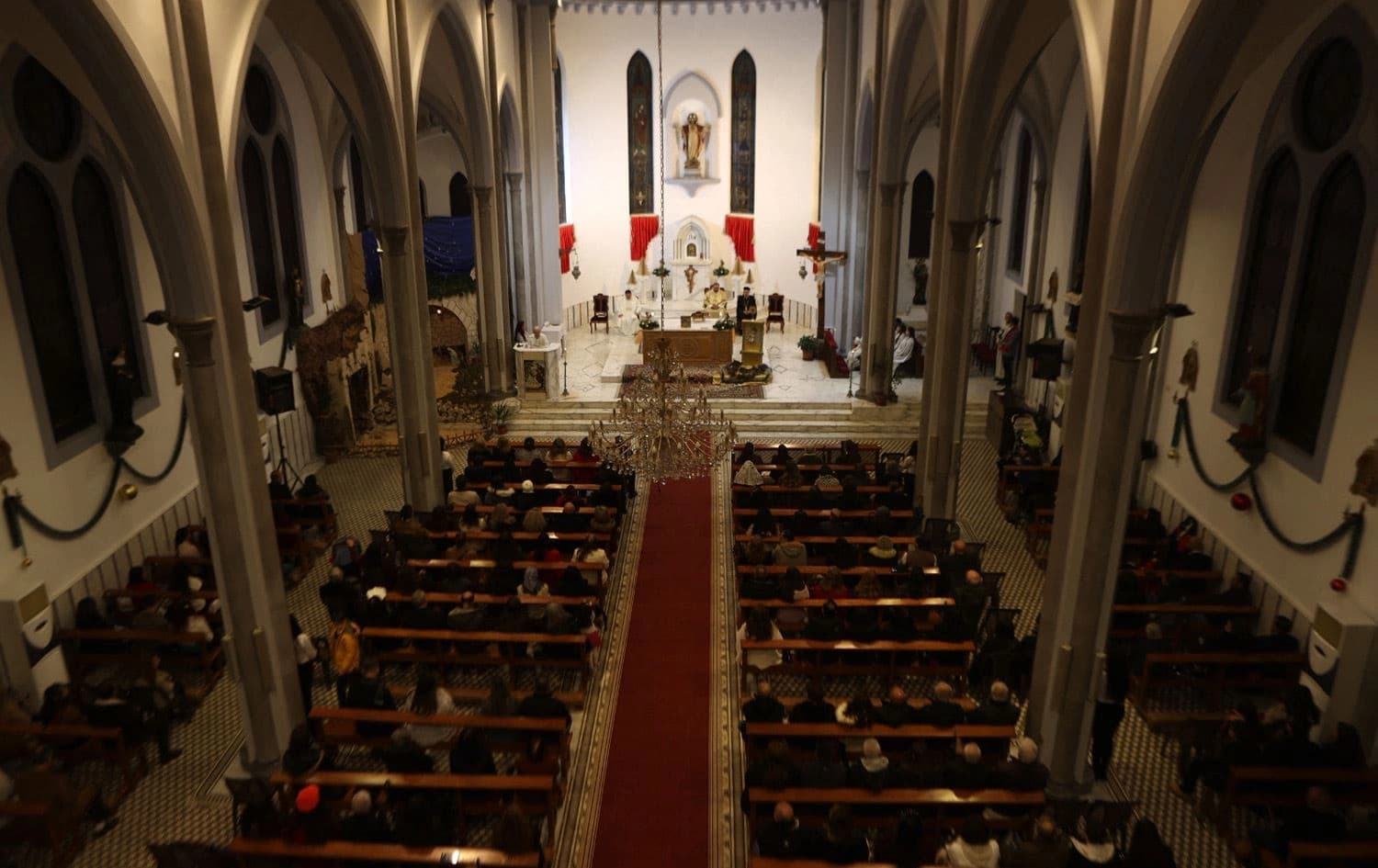 Christmas Eve mass at the Church of the Sacred Heart of Jesus in the Syrian port city of Latakia on December 24, 2024. Photo: Aaref Watad/AFP
