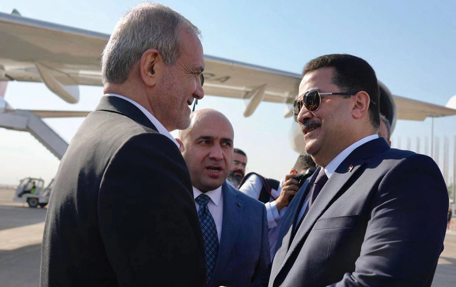 Iraqi Prime Minister Mohammed Shia' al-Sudani (right) receiving Iranian President Masoud Pezeshkian (left) in Baghdad International Airport on September 11, 2024. Photo: Sudani's office