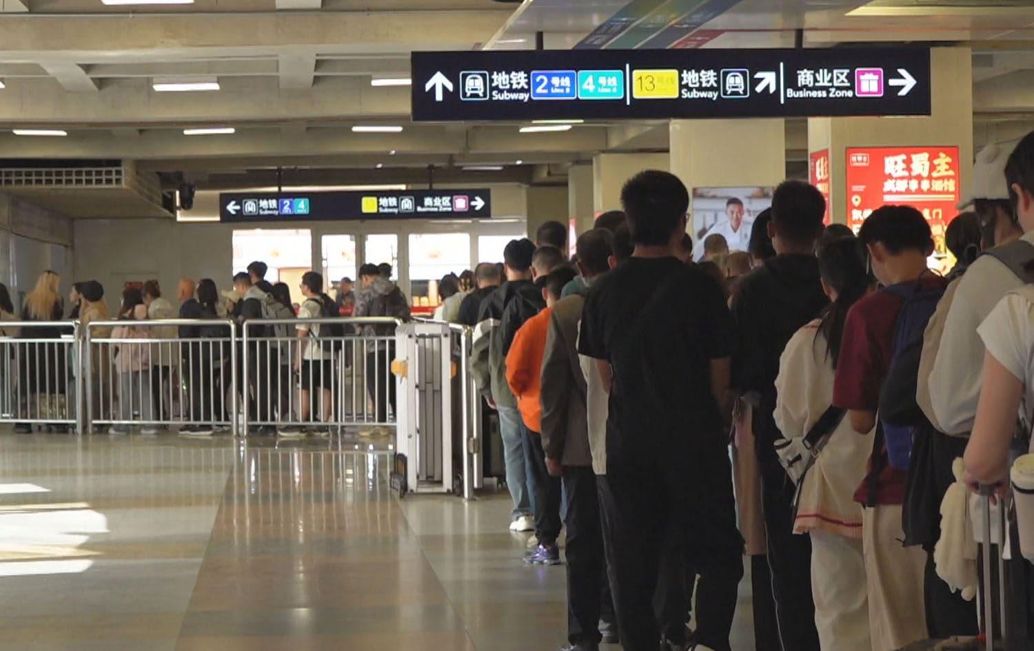 People in Beijing waiting in line for the metro January, 2025. Photo: Rudaw 