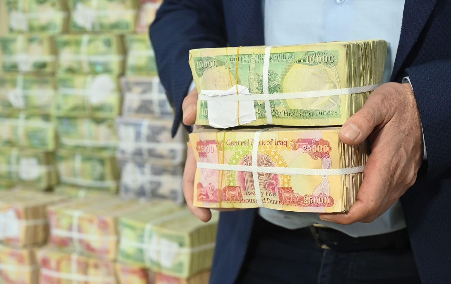 Iraqi dinar notes. File photo: Bilind T. Abdullah/Rudaw