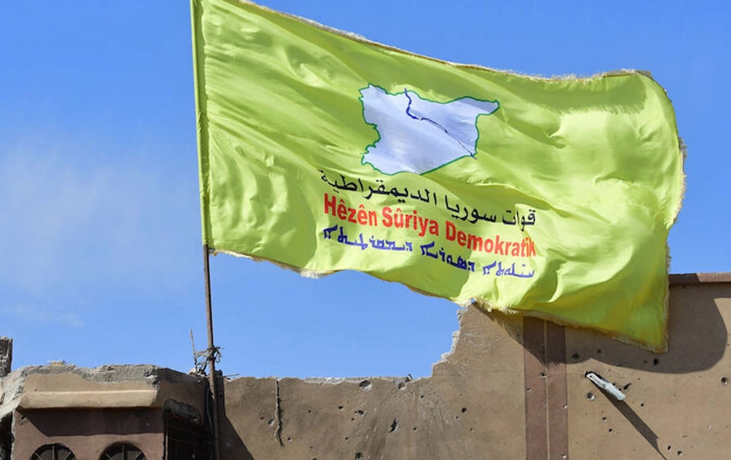 A flag of the Syrian Democratic Forces (SDF) in northeastern Syria. Photo: Giuseppe Cacace/AFP