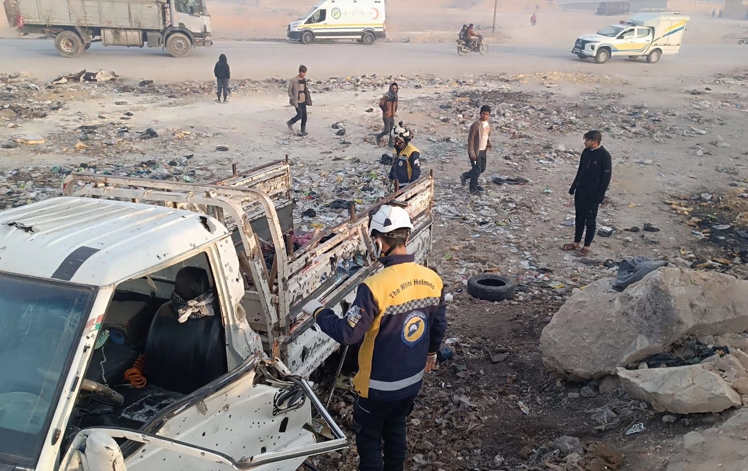 Wreckage from the scene after a car bomb killed 15 farm workers and injured an additional 15 on the outskirts of Manbij in northern Syria on February 3, 2025. Photo: White Helmets/X