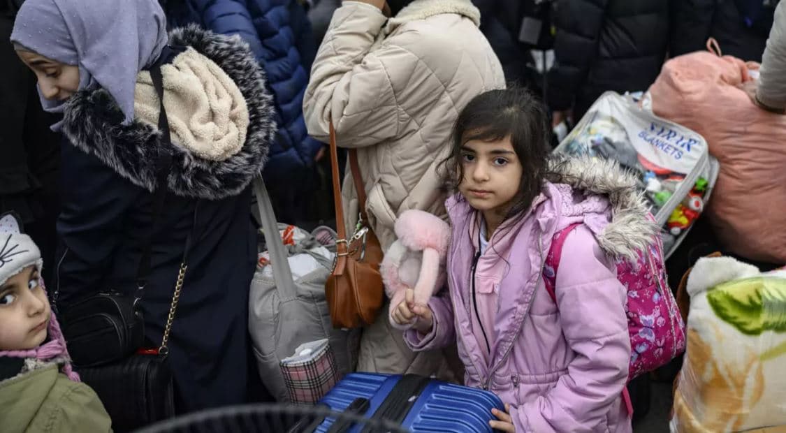 A Syrian refugee returning from Turkey to Syria. Photo: AFP/file