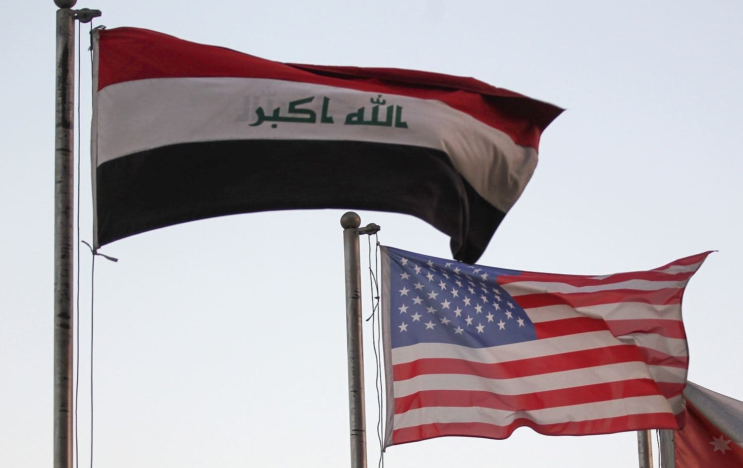 The Iraqi and US flags sway outside a hotel in Baghdad on September 27, 2020. Photo: Ahmad al-Rubaye/AFP