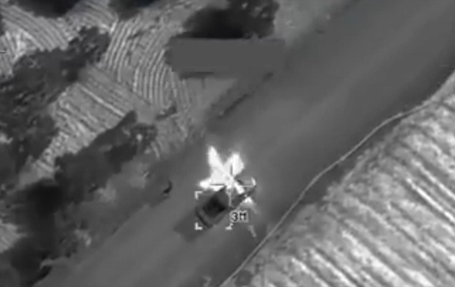 The moment a US airstrike struck a vehicle in northwest Syria. The US military said a senior leader of an al-Qaeda affiliate was killed in the strike. Photo: screengrab/CENTCOM video