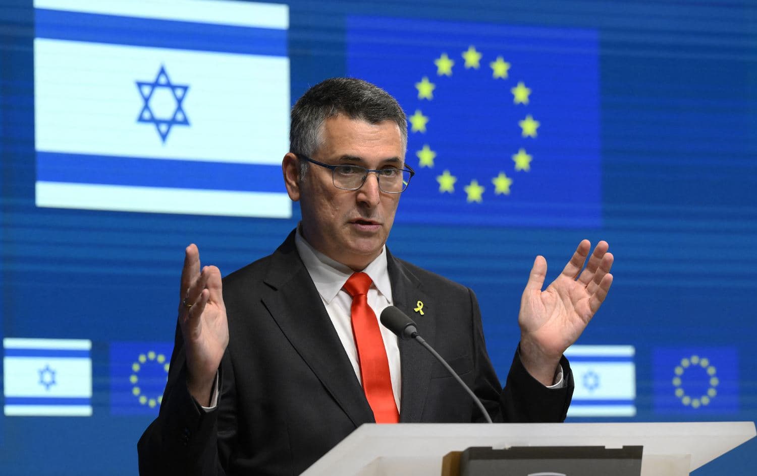 Israeli Foreign Minister Gideon Saar addresses a press conference after a meeting at the EU headquarters on the sidelines of the EU's foreign affairs council, in Brussels on February 24, 2025. (Photo by JOHN THYS / AFP)