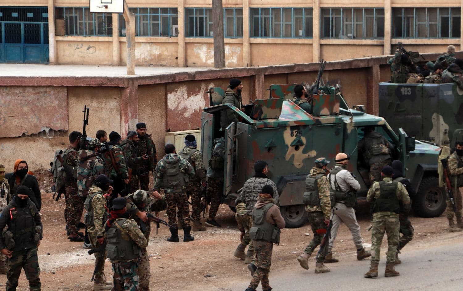 Members of Syria's new authorities security forces gather in al-Sanamayn, in the southern province of Daraa, during a reported large scale military campaign on March 5, 2025. Photo: AFP