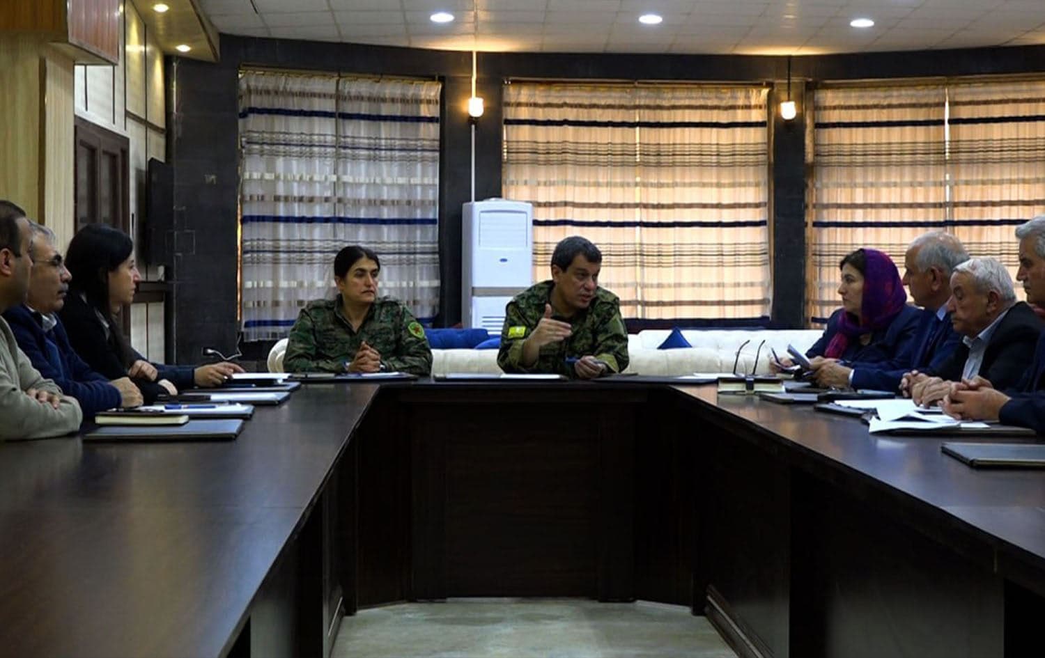 Meeting between Rojava's ruling PYD and opposition ENKS in Qamishli, Rojava on March 18, 2025. Photo: SDF media. 