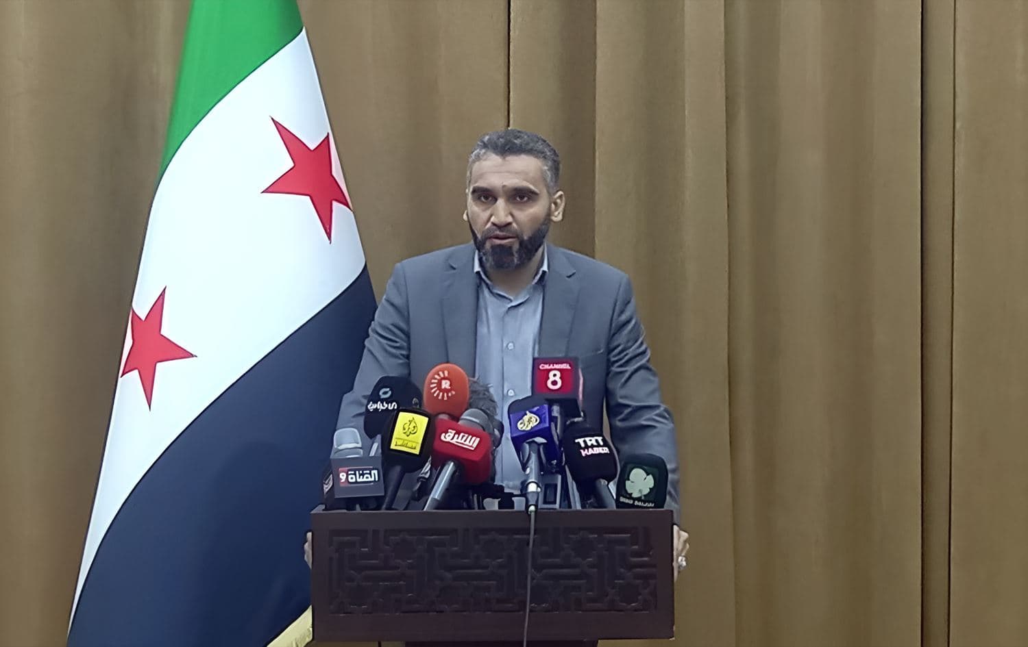 Syria’s Electricity Minister Omar Shaqrouq speaking during a press conference in Damascus on March 19, 2025. Photo: screengrab/Rudaw