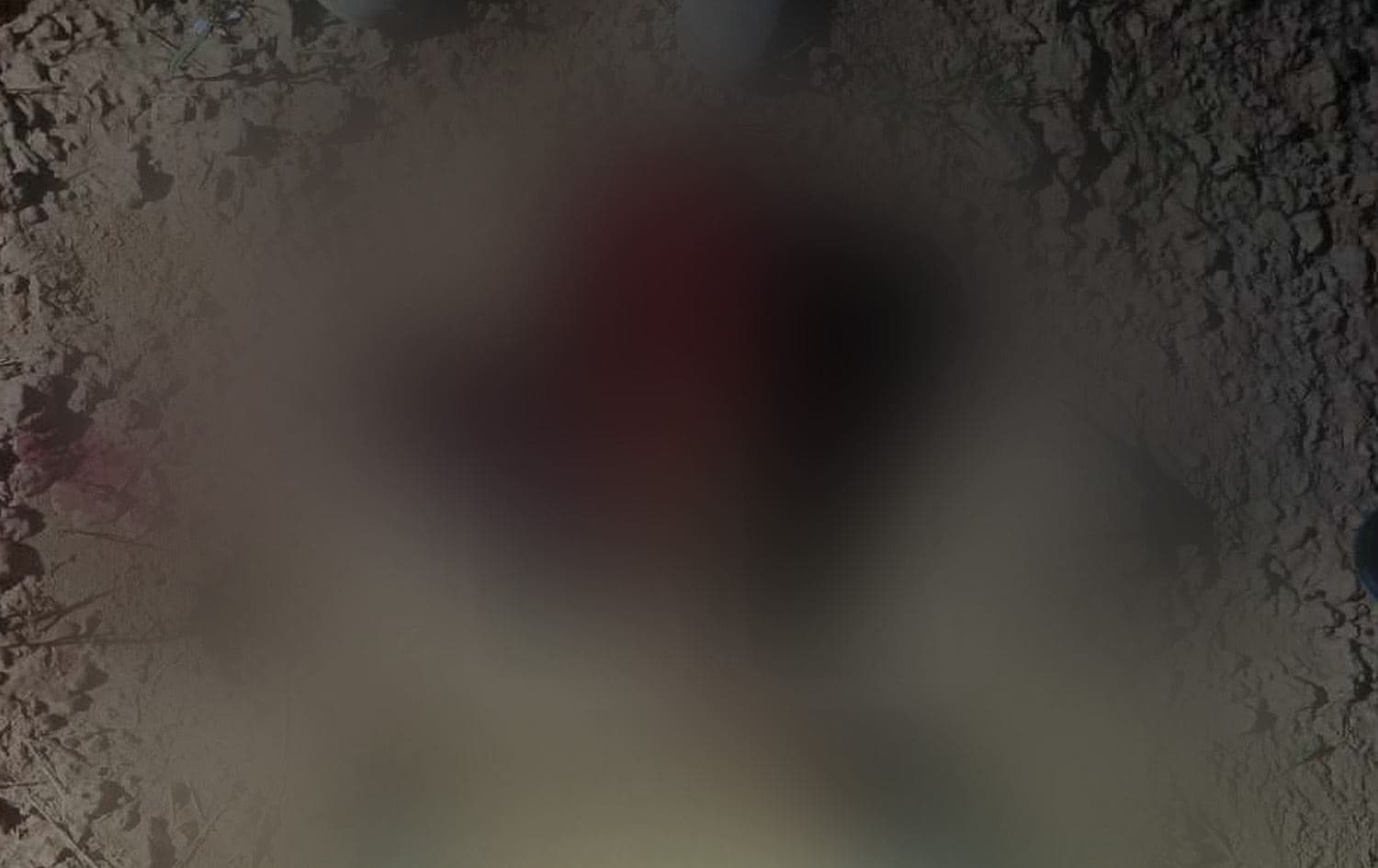 یەکێک لە داعشە کوژراوەکان. لەبەر هەستیاری وێنەکە، بلەر کراوە.