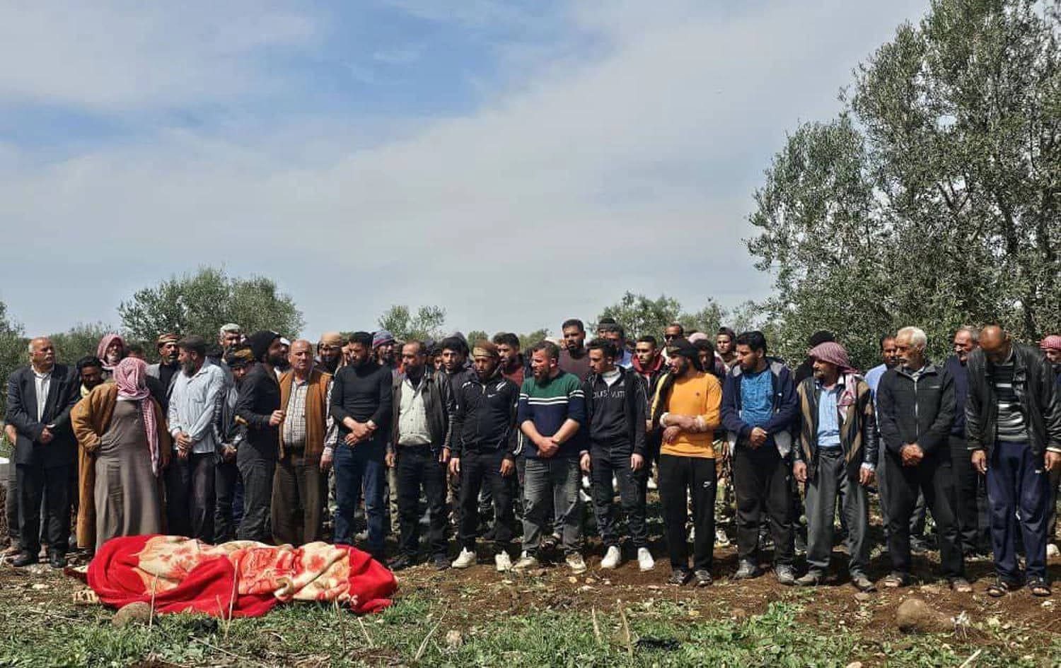 Locals lay to rest relative killed in an Israeli airstrike in Koya town, west of Daraa, on March 25, 2025. Photo: Daraa Province Media