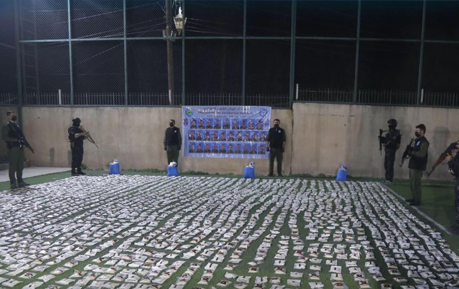A large quantity of Captagon is displayed after being seized by Kurdish security forces (Asayish) in northeast Syria’s (Rojava) Qamishli city on March 25, 2025. Photo: Asayish 