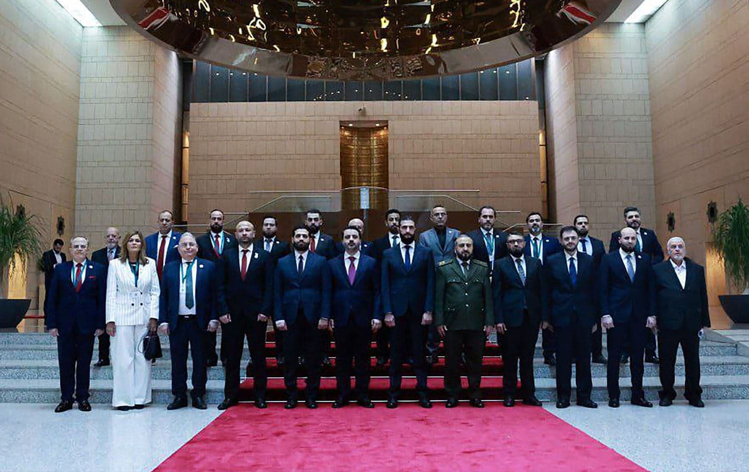 Syria's interim President Ahmed al-Sharaa and the 23 newly-appointed ministers on March 29, 2025. Photo: SANA