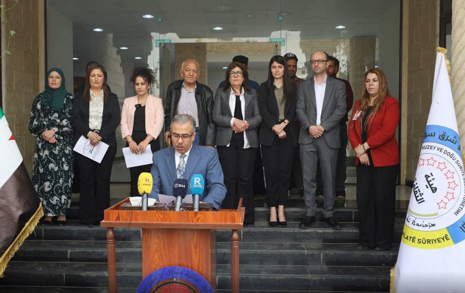 Authorities from the Kurdish-led Democratic Autonomous Administration of North and East Syria (DAANES) delivering a press conference on April 9, 2025 to condemn the remarks by Syrian Cultural Minister Mohammed Saleh regarding the Syriac language. Photo: DAANES