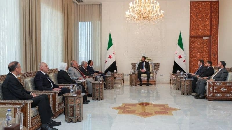 Syria’s interim President Ahmed al-Sharaa receives the committee tasked with probing the deadly violence in west Syria on April 10, 2025. Photo: Syrian Presidency