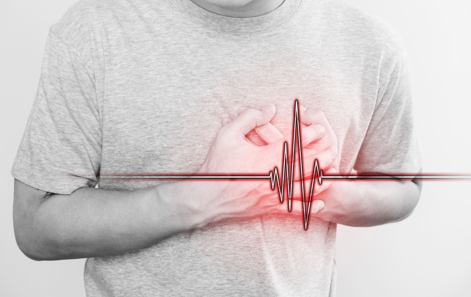 ئاماژەیەک بە هێڵکاریی دڵ و نیشانەیەکی جەڵتەی دڵ. وێنە: NHS