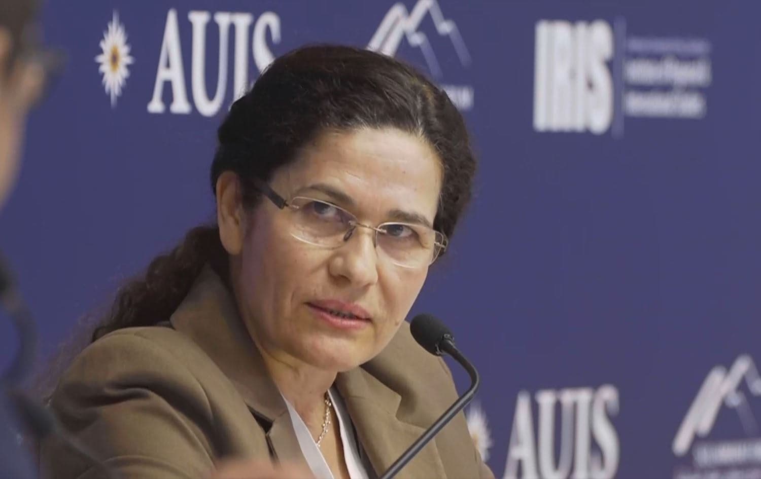 Elham Ahmed, co-chair of Rojava’s foreign relations office, speaking during a panel discussion at the Sulaimani Forum on April 17, 2025. Photo: screengrab/AUIS.