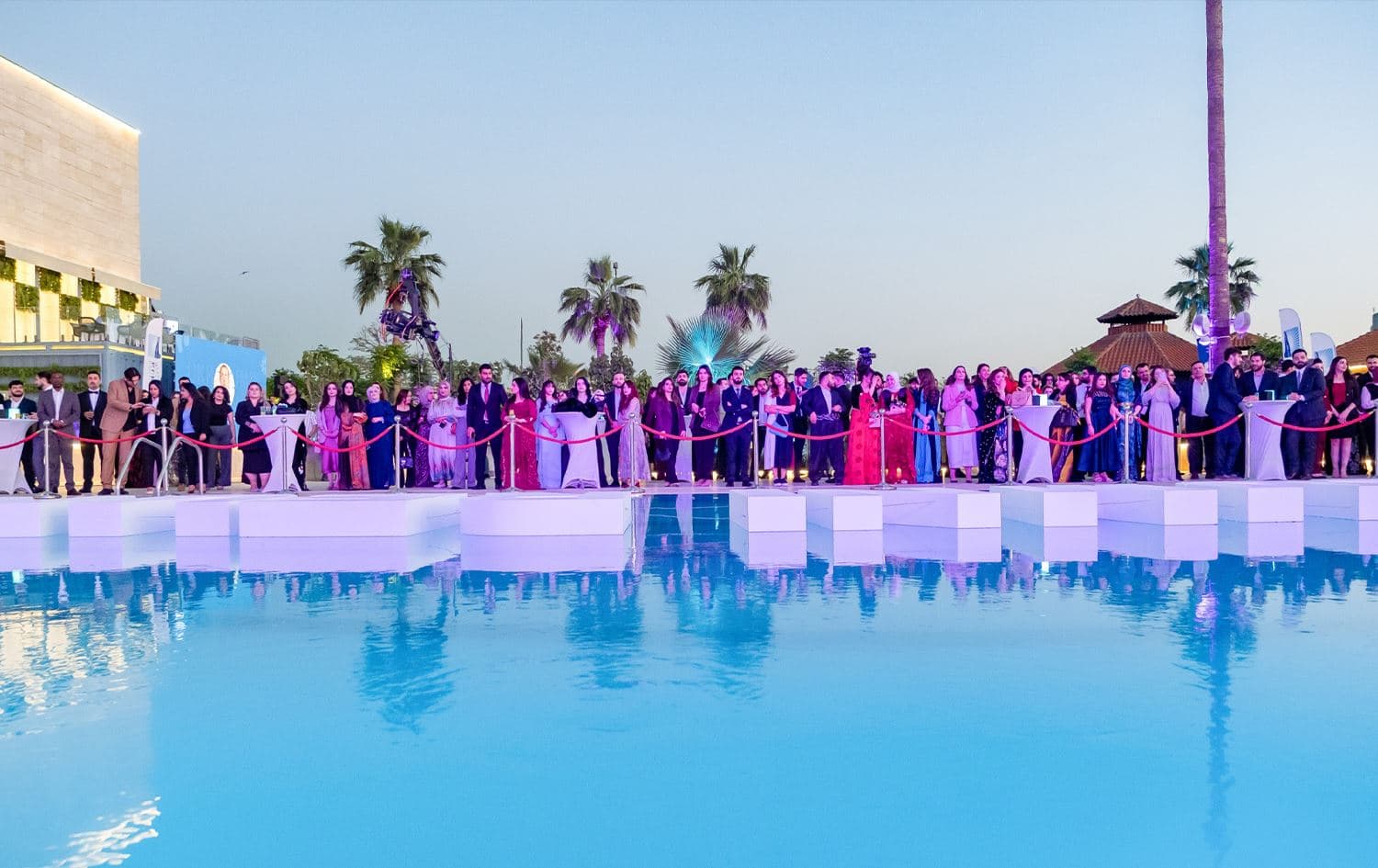 The University of Kurdistan Hewler (UKH) alumni post for a photo during a reunion party in Erbil on April 19, 2025. Photo: Bilind.T Abdullah/Rudaw
