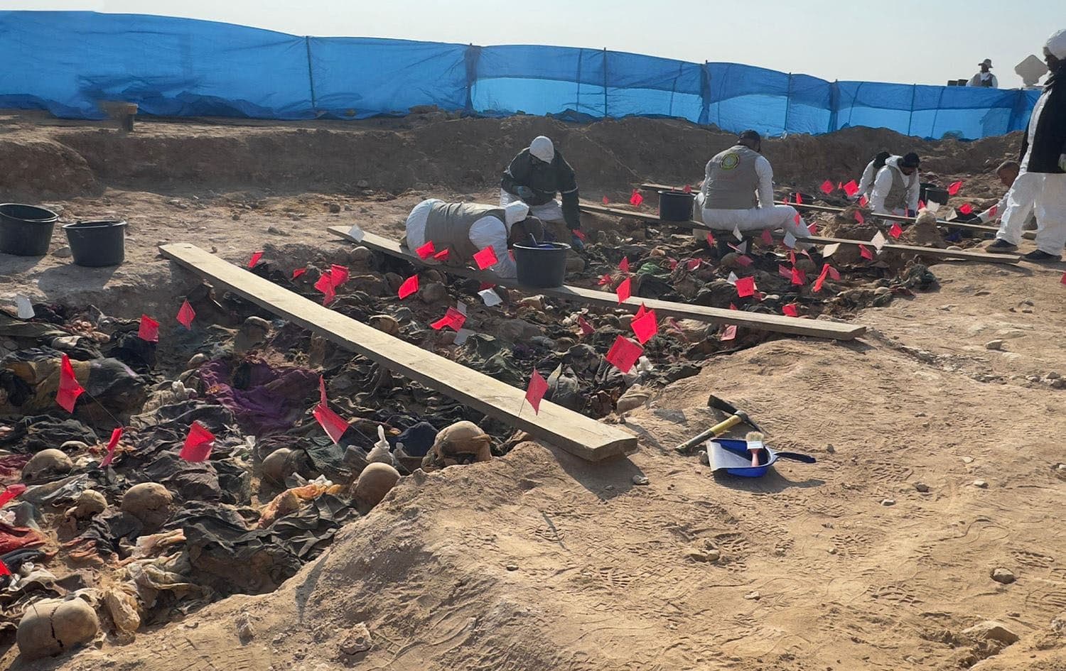 A mass grave uncovered in Samawa's Tal Sheikh area on December 23, 2024. Photo: Rudaw