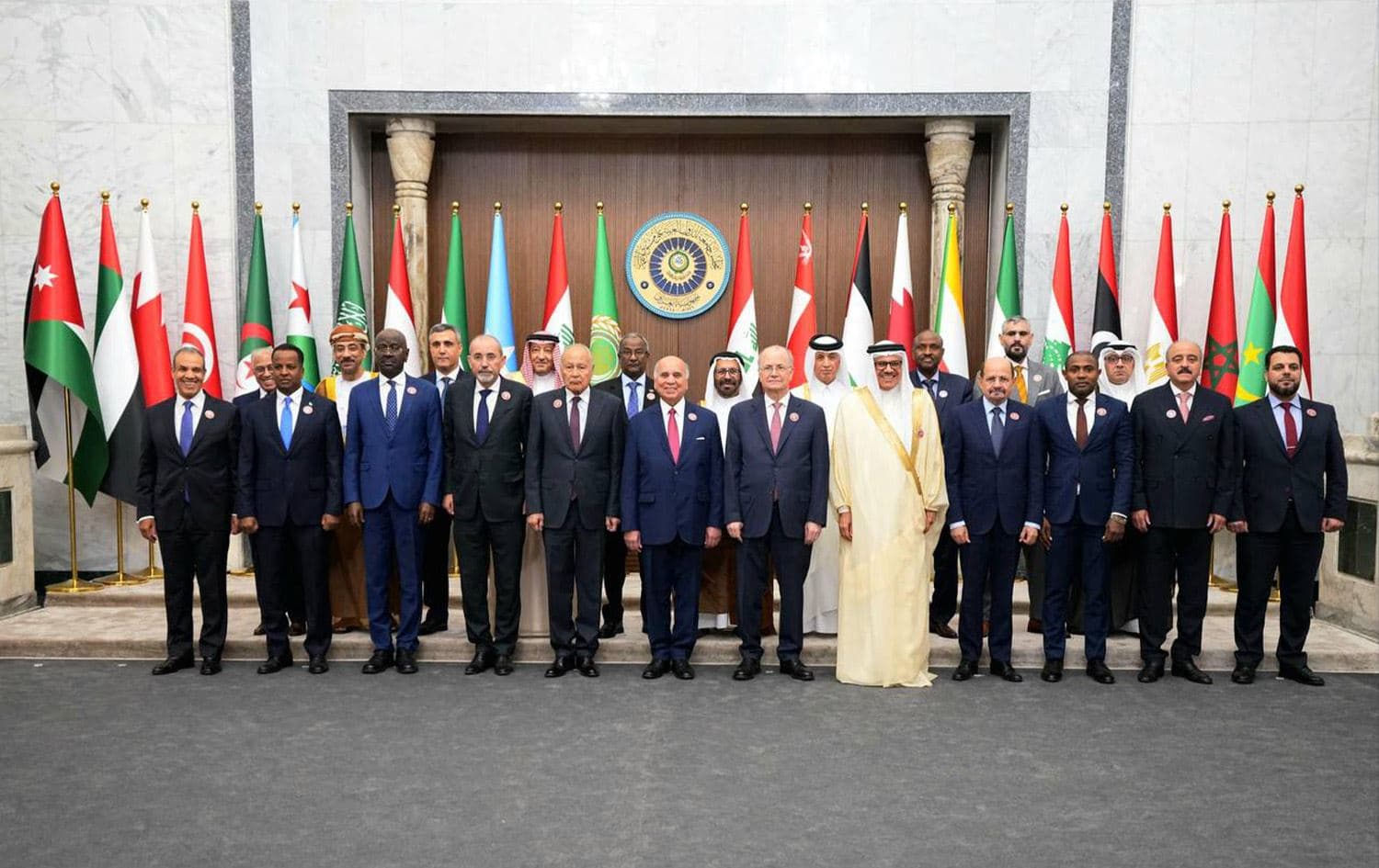Iraqi Foreign Minister Fuad Hussein (center) posing for a group picture in Baghdad with counterparts from the Arab League member states on May 15, 2025 during their meeting to prepare Iraq's upcoming Arab summit. Photo: Sudani's office/AFP