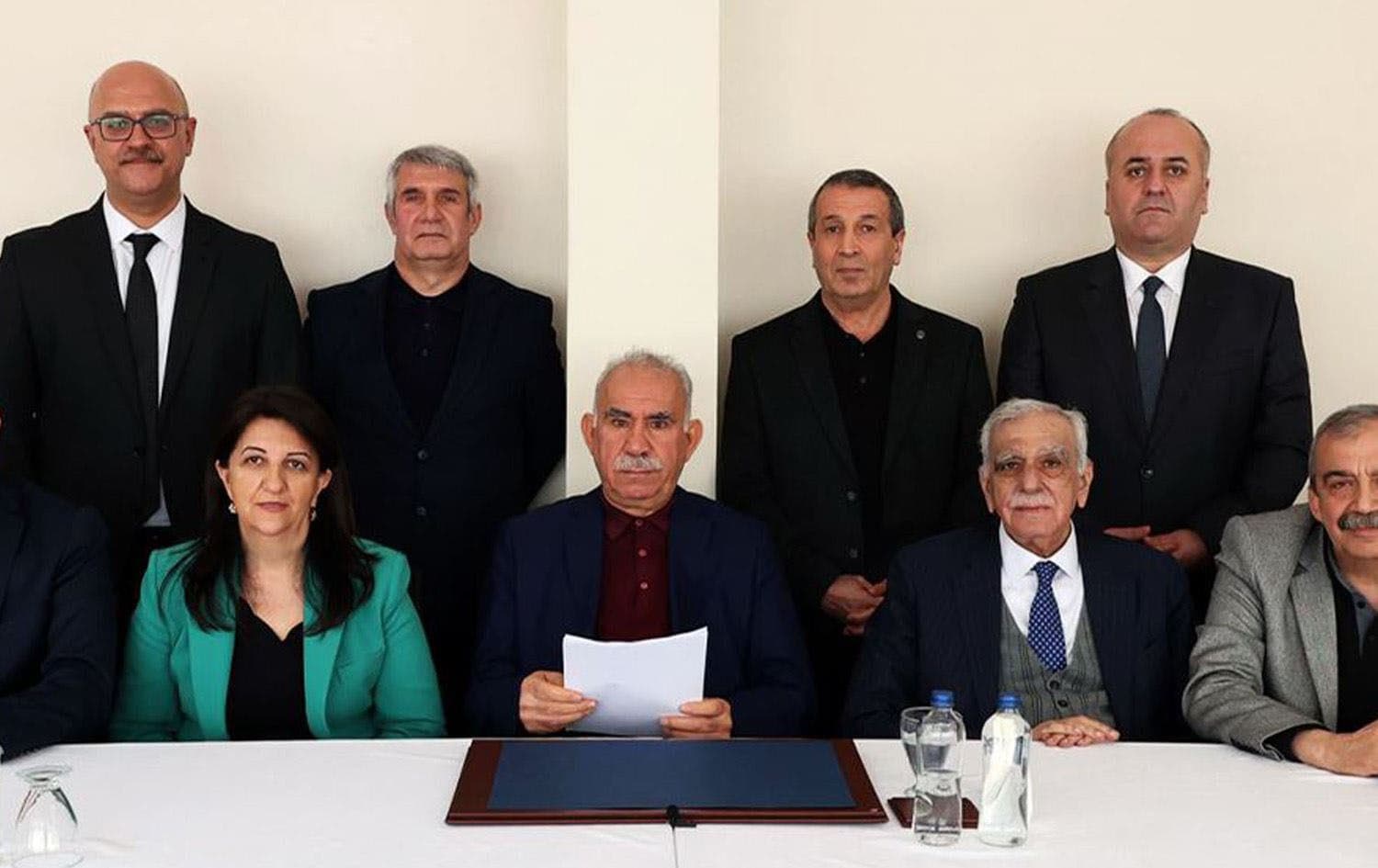Jailed PKK leader Abdullah Ocalan (middle) with DEM Party delegates in Imrali prison in February 2025. Photo: DEM Party