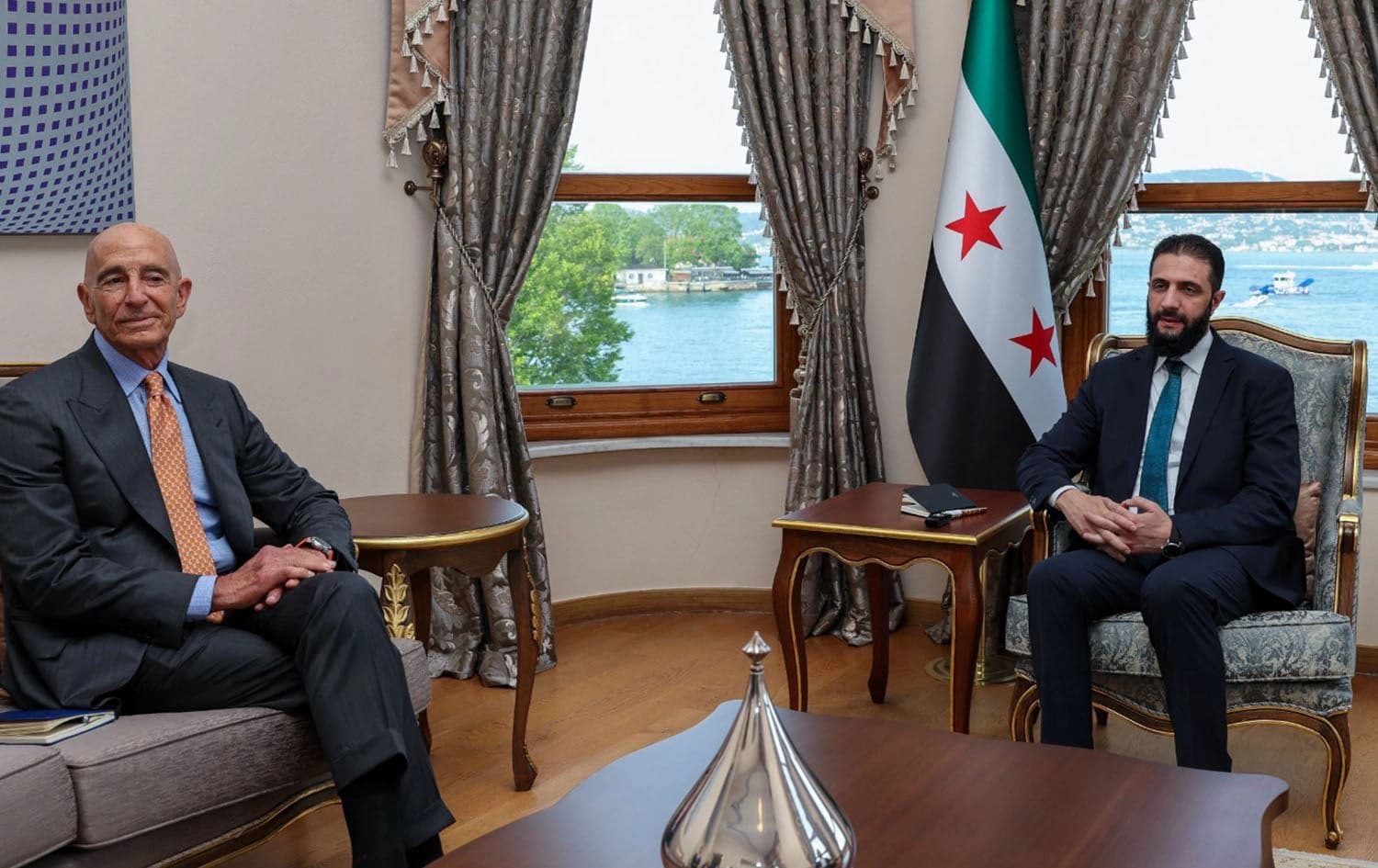 Syria’s interim President Ahmed al-Sharaa (right) meeting US Ambassador to Turkey and Special Envoy for Syria Tom Barrack (left) in Istanbul on May 24, 2025. Photo: Turkish foreign ministry/AFP