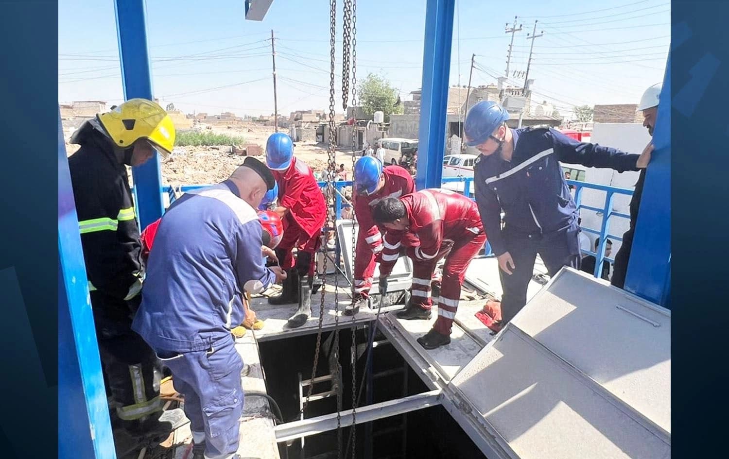 A civil defense team trying to recover the bodies of two dead workers in a sewer in Baghdad on May 25, 2025. Photo: Submitted